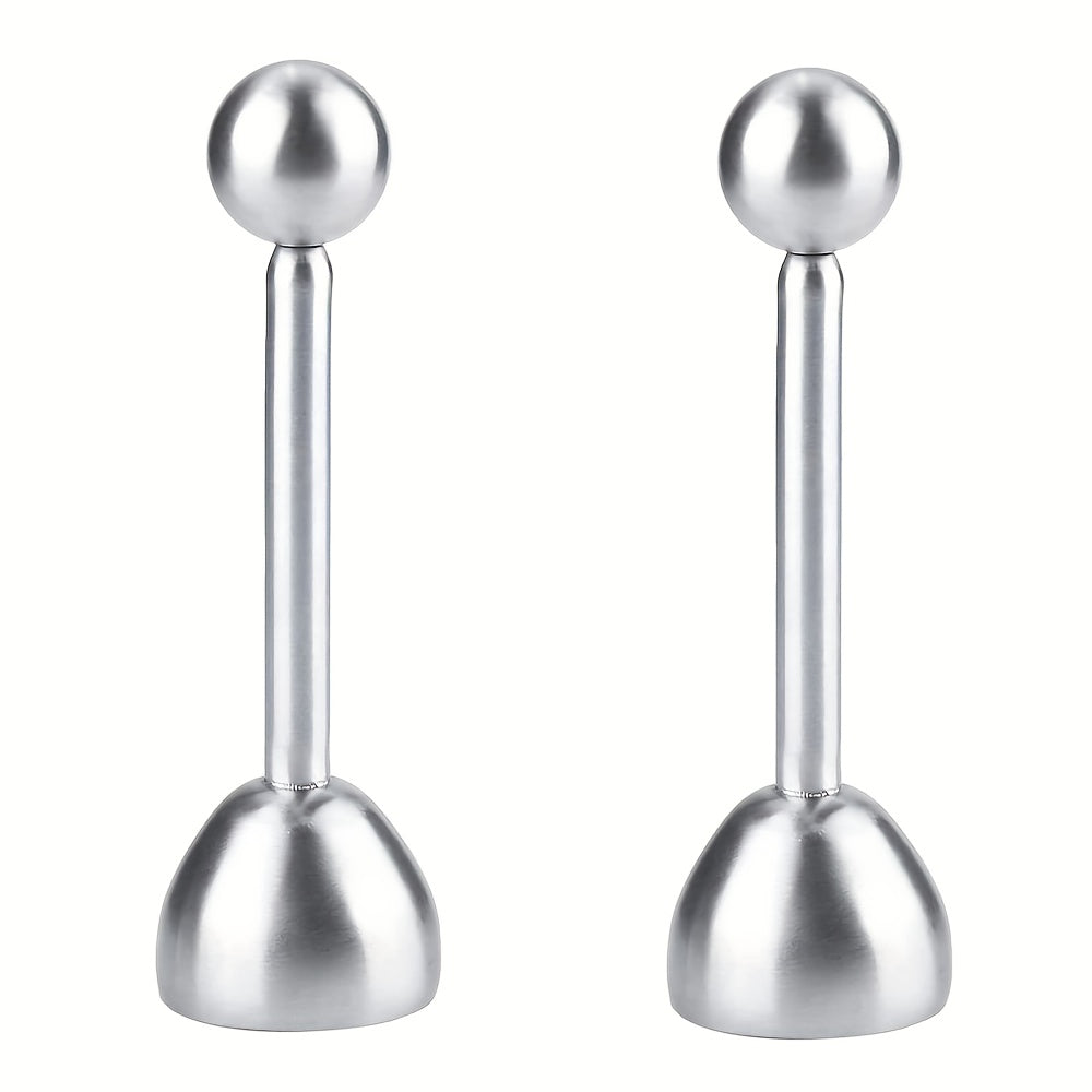 Två Kitchlark äggknäckare i rostfritt stål, produktfoto mot ljus bakgrund